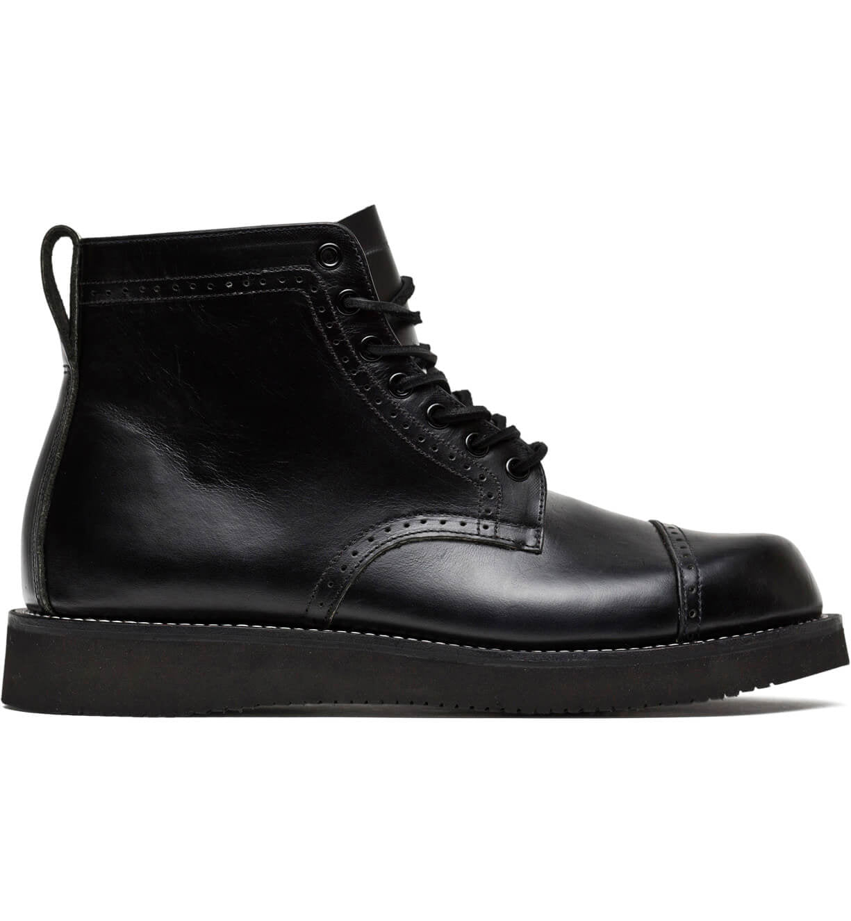 A black leather pair of Aaron boots from the Broken Homme collection featuring a cap toe silhouette, set against a clean white background.