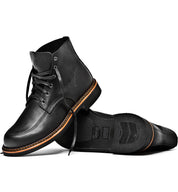 A comfortable pair of Davis boots by Broken Homme on a white background.