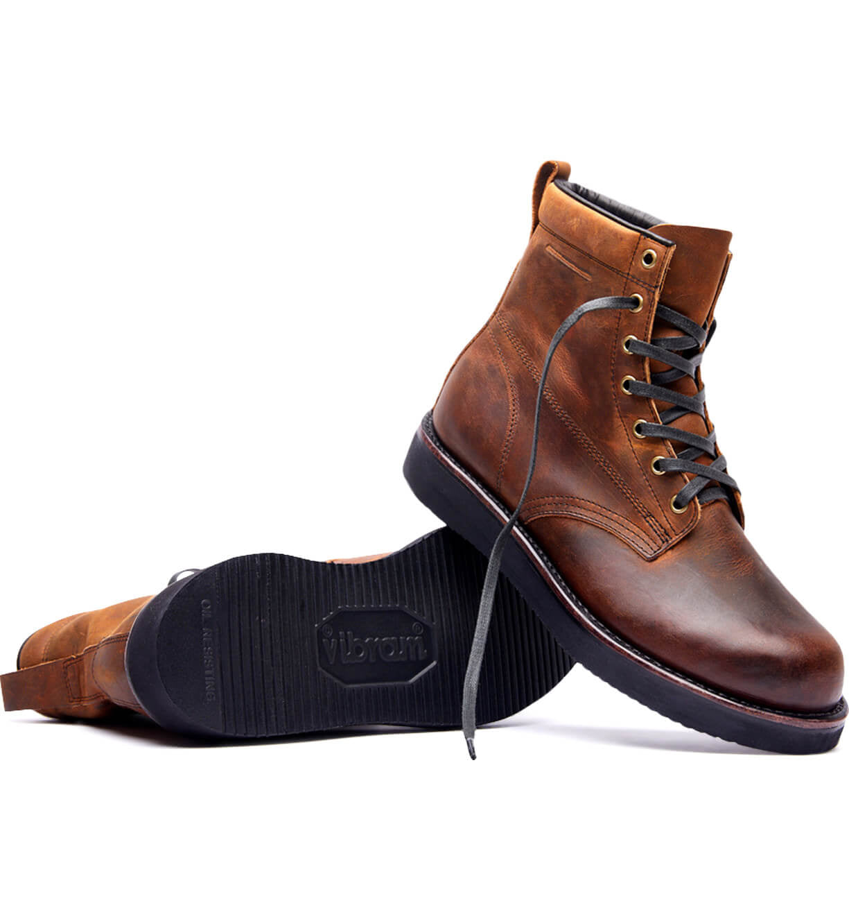 A pair of brown leather James boots by Broken Homme on a white background.