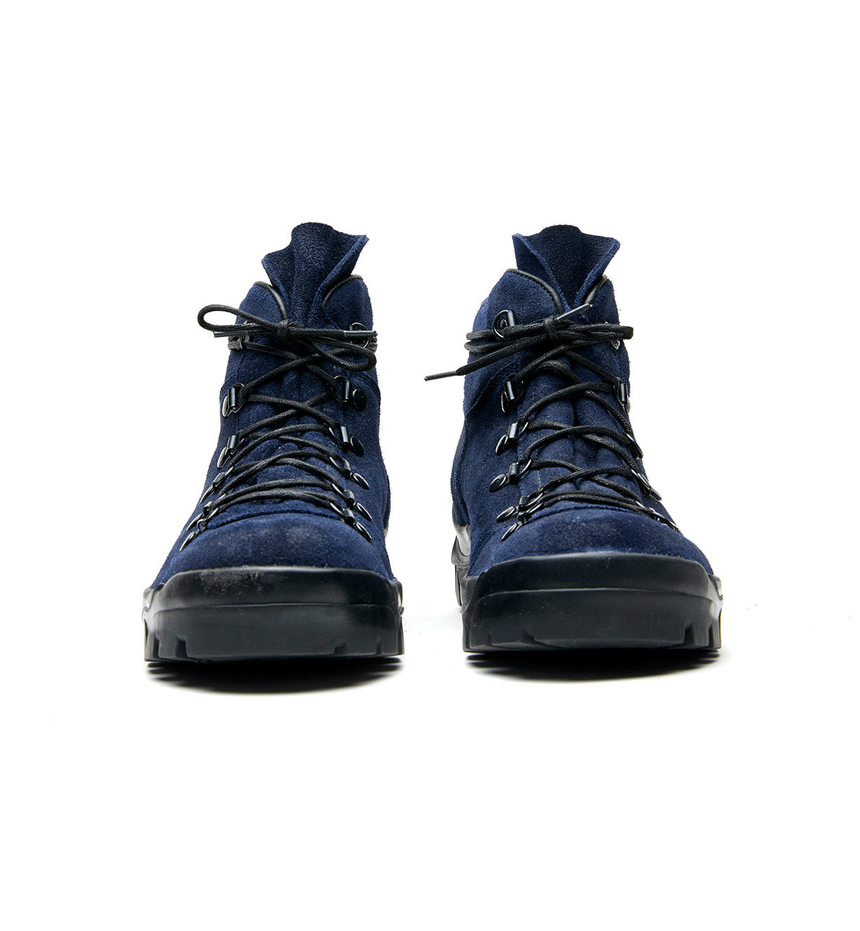 A pair of blue suede Broken Homme Weber boots with black laces.