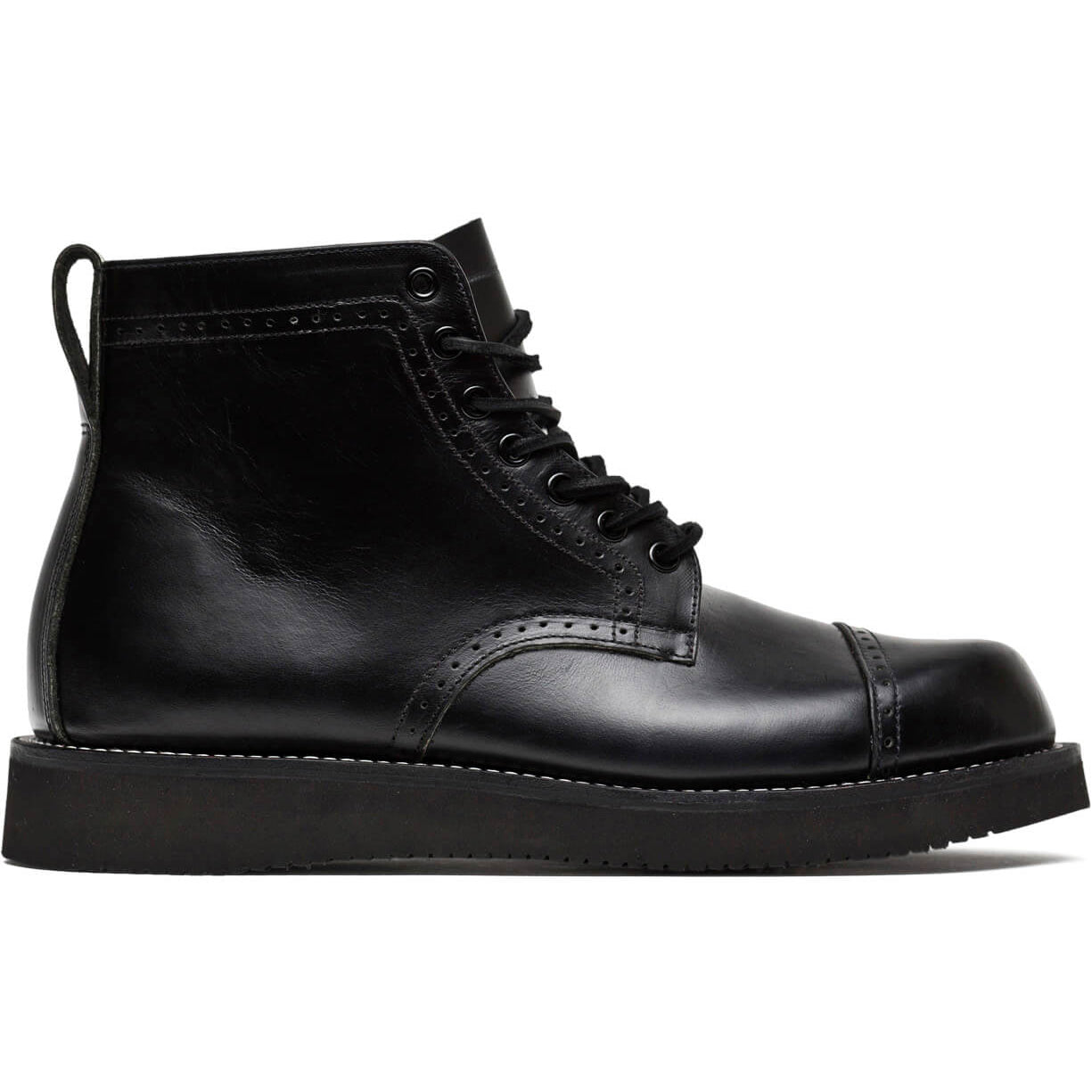 A black leather pair of Aaron boots from the Broken Homme collection featuring a cap toe silhouette, set against a clean white background.