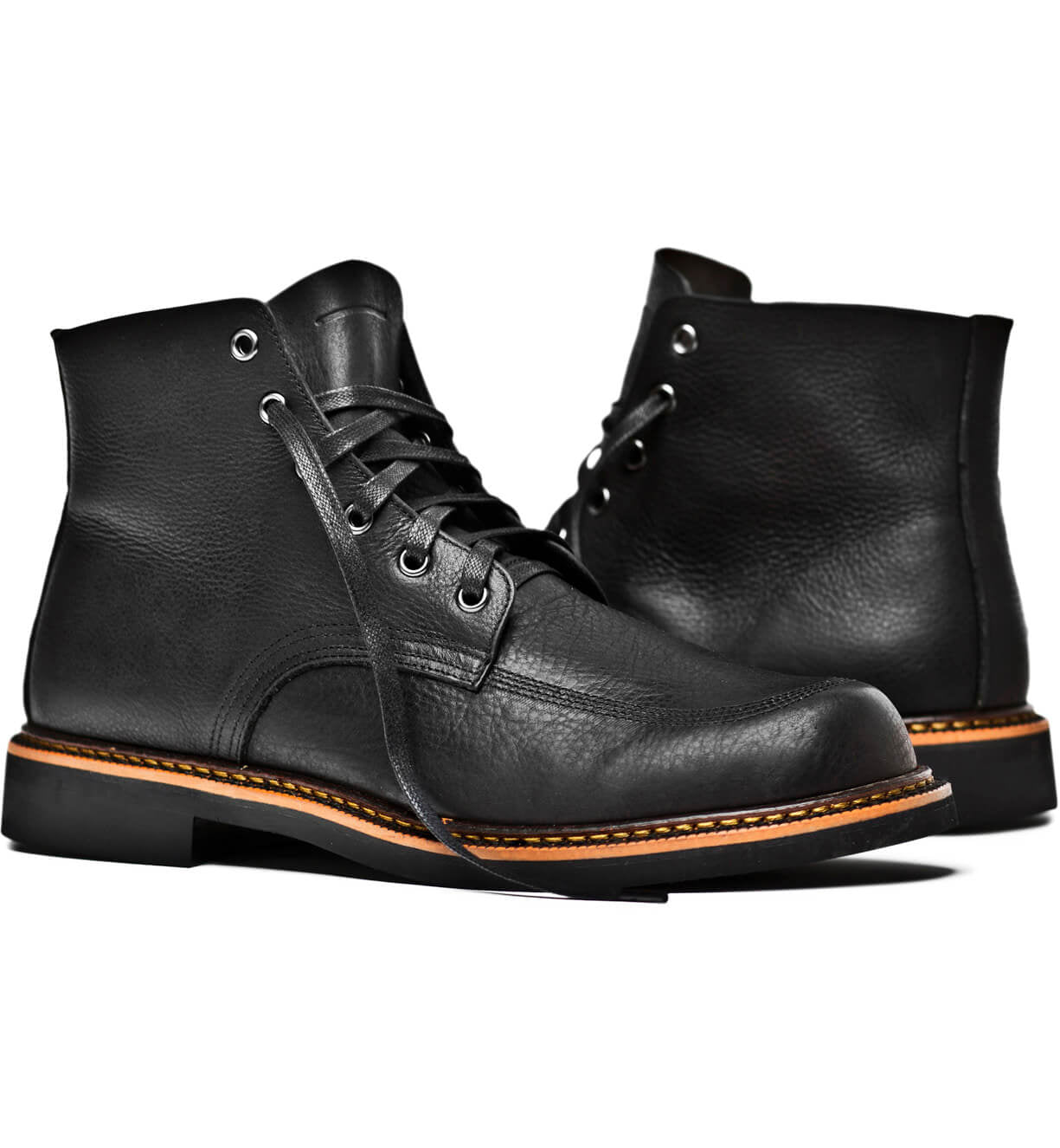 A comfortable pair of Davis black leather boots on a white background by Broken Homme.