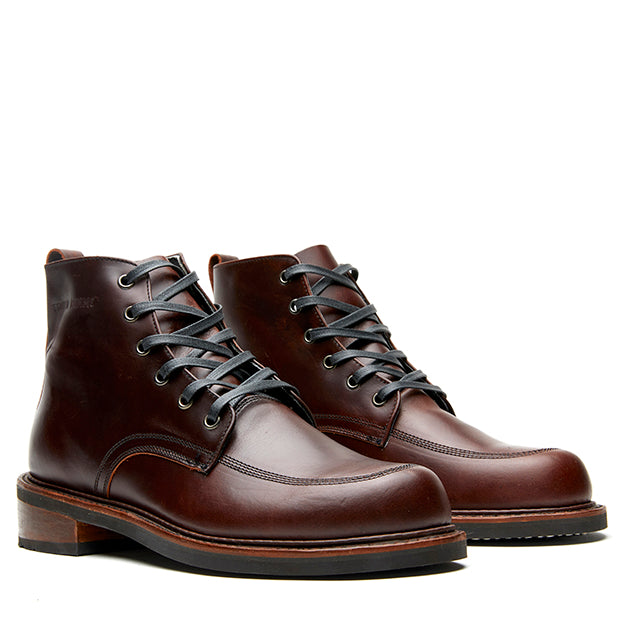 A pair of Davis II men's brown work boots with laces by Broken Homme.