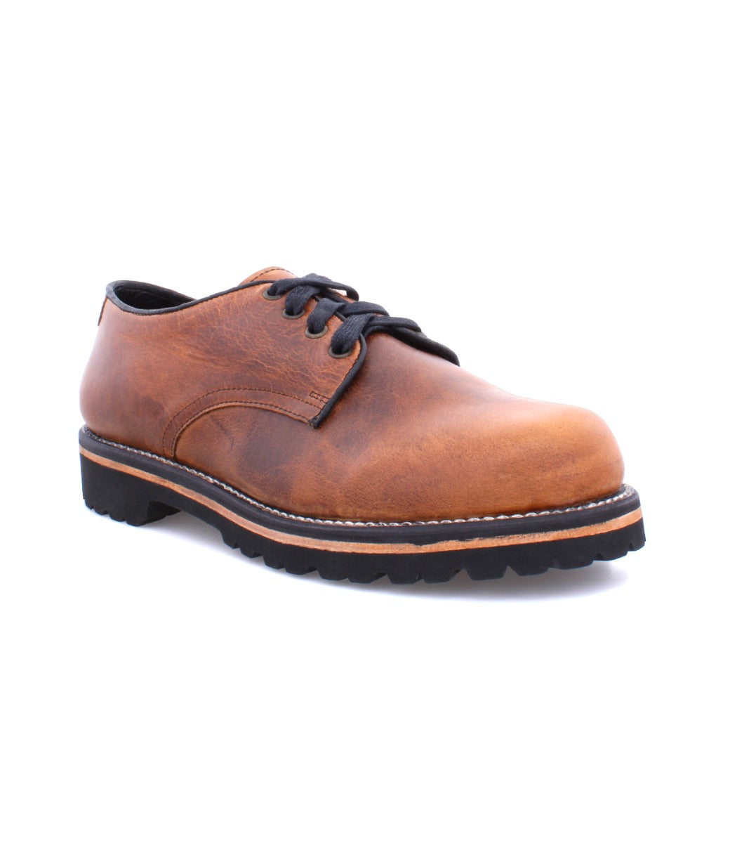 A classic men's brown Gavin Oxford shoe with leather uppers on a white background by Broken Homme.