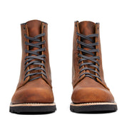 A pair of Jacob men's brown leather boots with laces, made in the USA by Broken Homme.