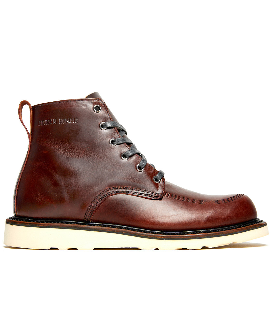 A comfortable fit Jaime Boot made by Broken Homme, made of brown leather on a white background.