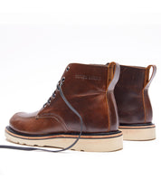 A pair of Jaime Boots by Broken Homme on a white background.