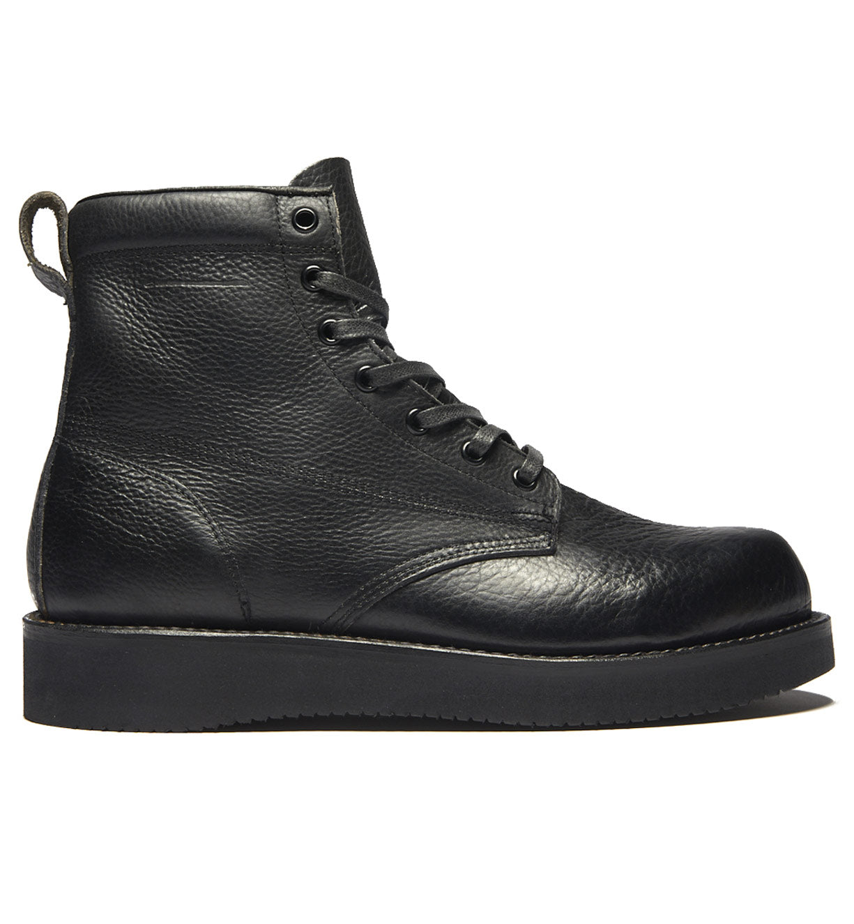A signature James Boot from the Broken Homme collection with a rubber sole.