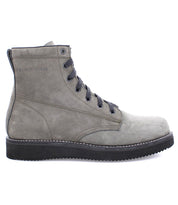 A grey men's James Boot from the Broken Homme collection with black soles.