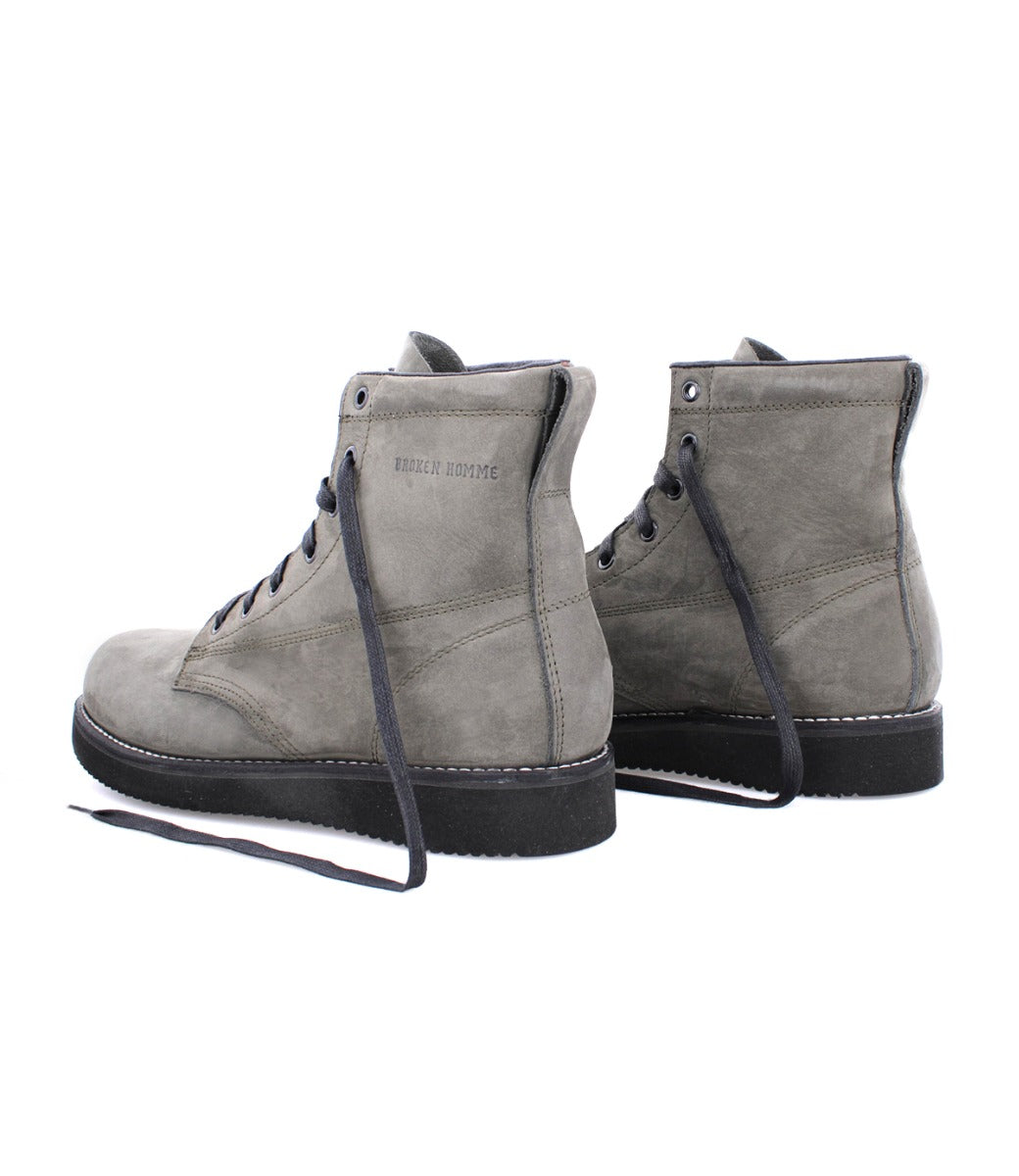 A pair of James Boots from the Broken Homme collection, featuring black laces.