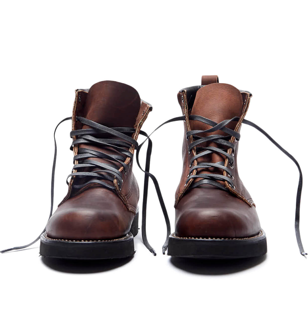 A pair of brown leather James boots from the Broken Homme collection on a white background.