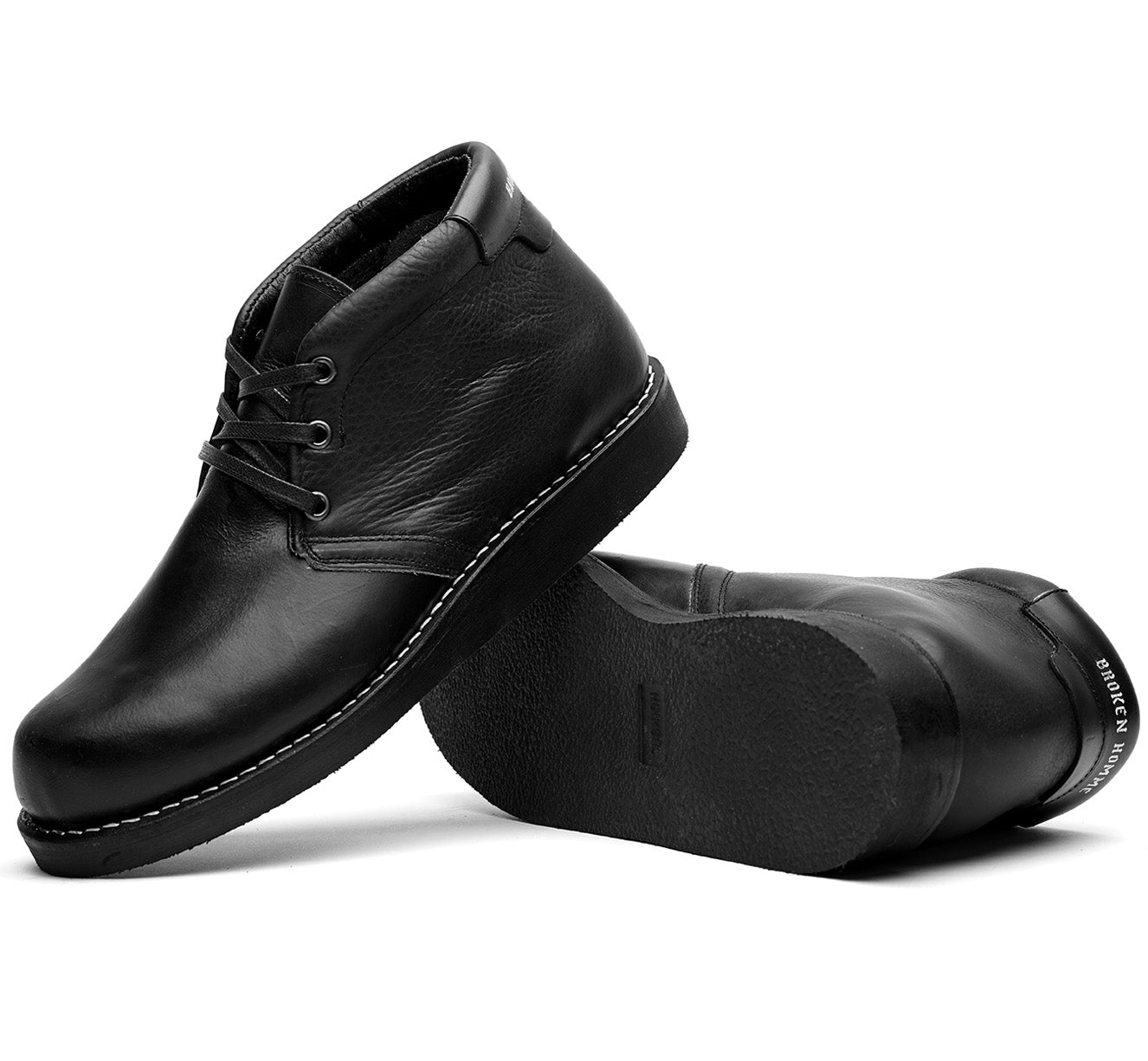 A pair of Jayson boots by Broken Homme on a white background.