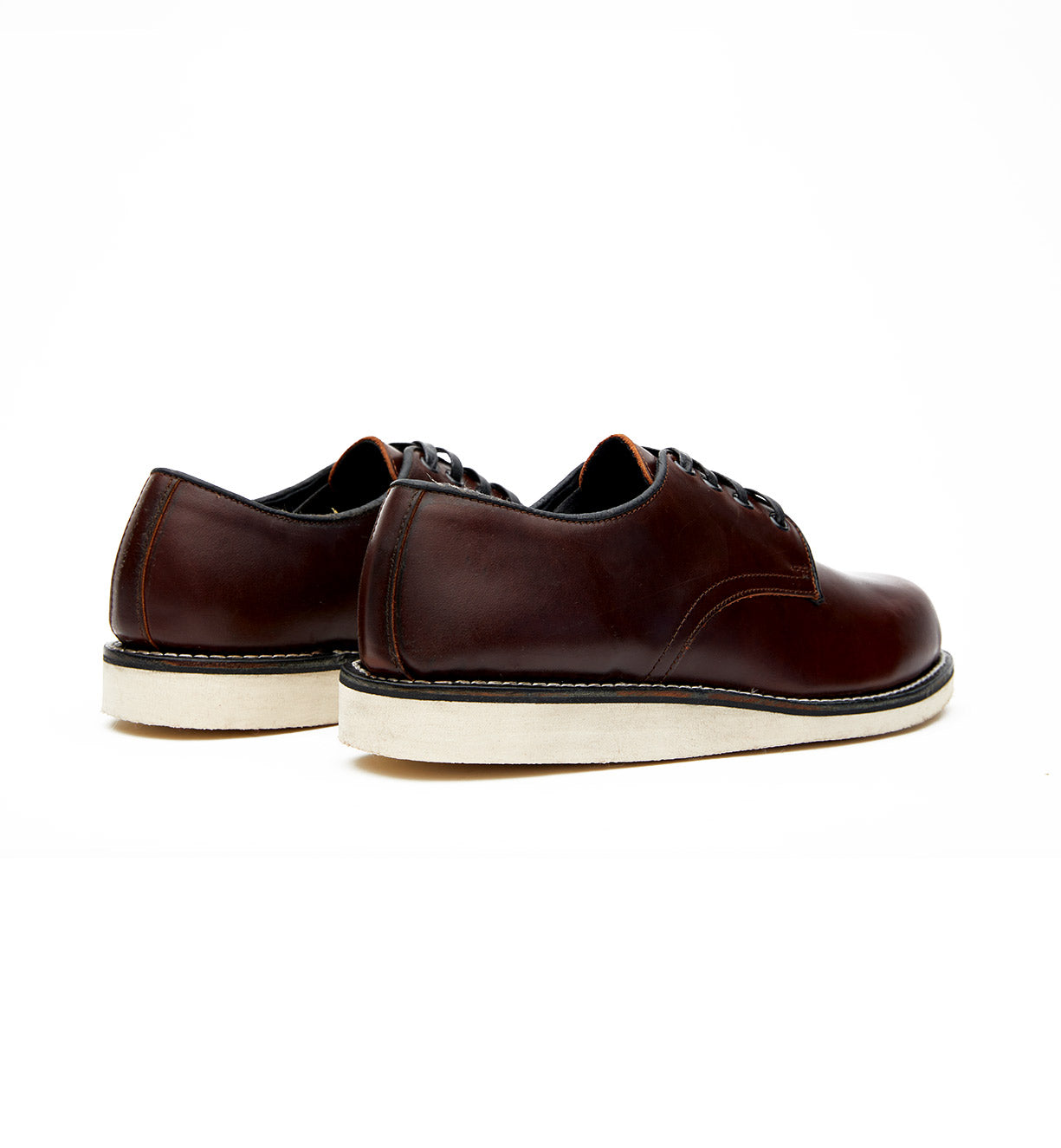 A pair of Michael II brown oxford shoes with full grain leather uppers on a white background by Broken Homme.