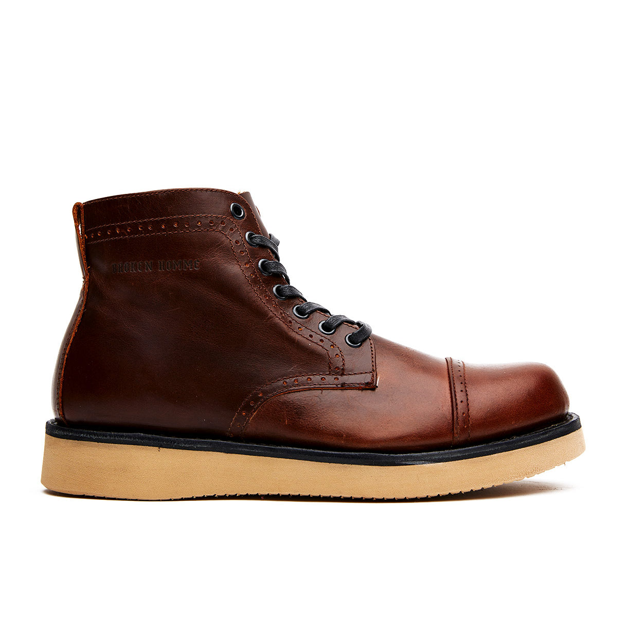 The Broken Homme Shaun boot, featuring a leather upper and rubber sole.