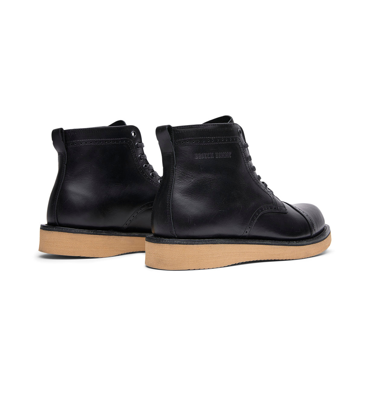 A pair of black leather Broken Homme Shaun boots featuring a goodyear welt, photographed on a white background.