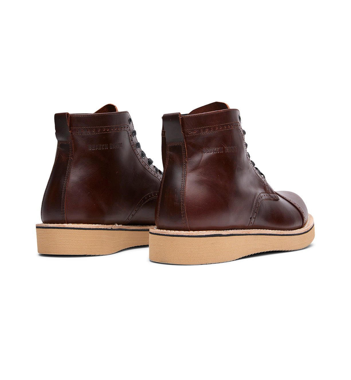 A pair of Shaun brown leather boots with a rubber sole from Broken Homme.