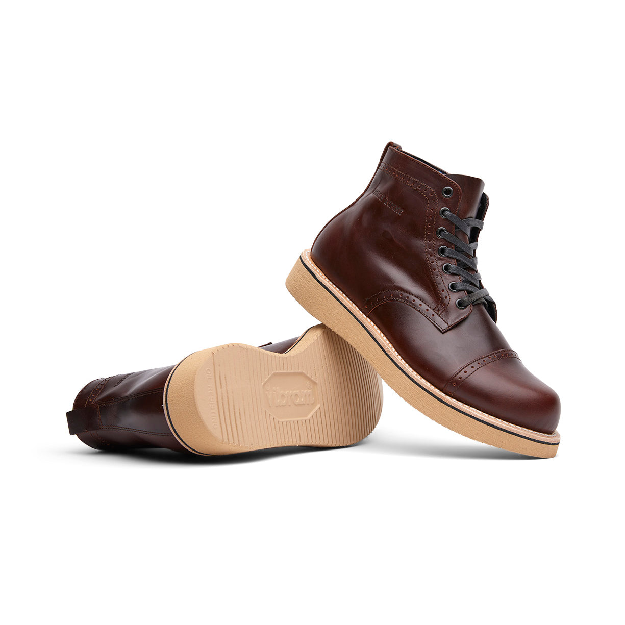 A pair of Shaun brown leather boots with a goodyear welt by Broken Homme on a white background.